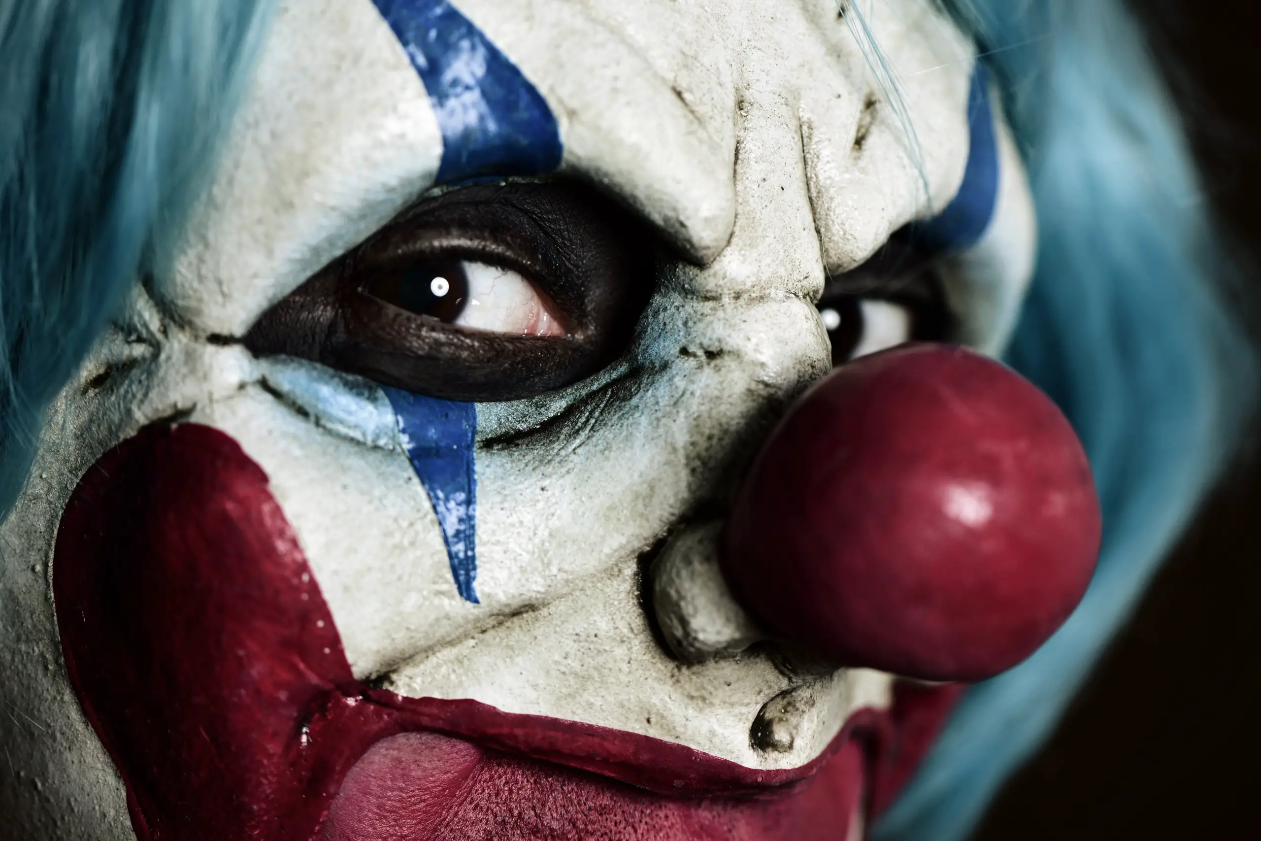 closeup of a scary evil clown