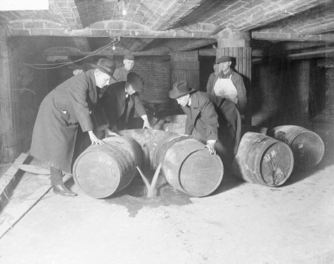 Prohibition agents destroying barrels of alcohol United States prohibition era